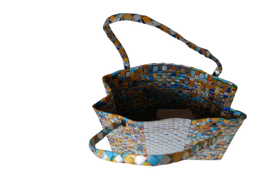Large banded handwoven bag handmade from recycled juice packs with clasp closure